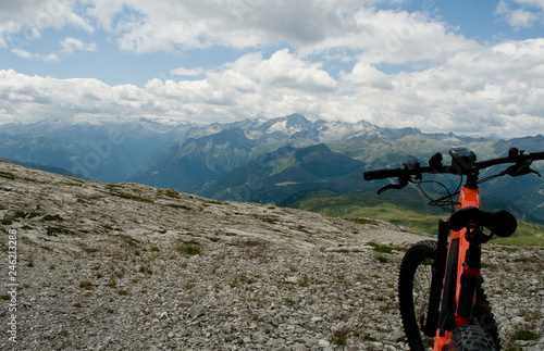detail of an electric bike, e-bike, ebike, mtb, rock mountains, Dolomites, unesco heritage, Madonna di Campiglio, summer, sport, adventure, travel, Alps, Trentino, Alto Adige, Italy