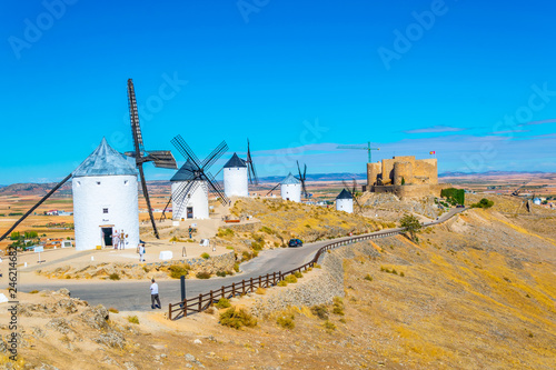 Castle at Consuegra surrounded with white windmills, Spain
