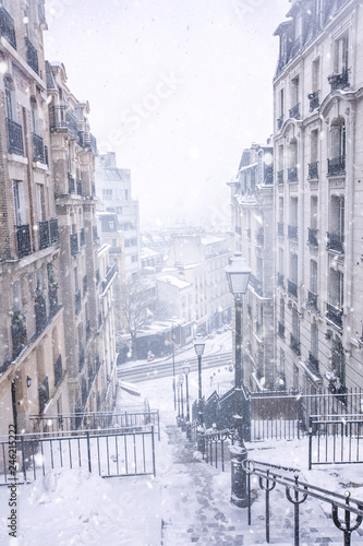 Photography Paris street covered with a snow