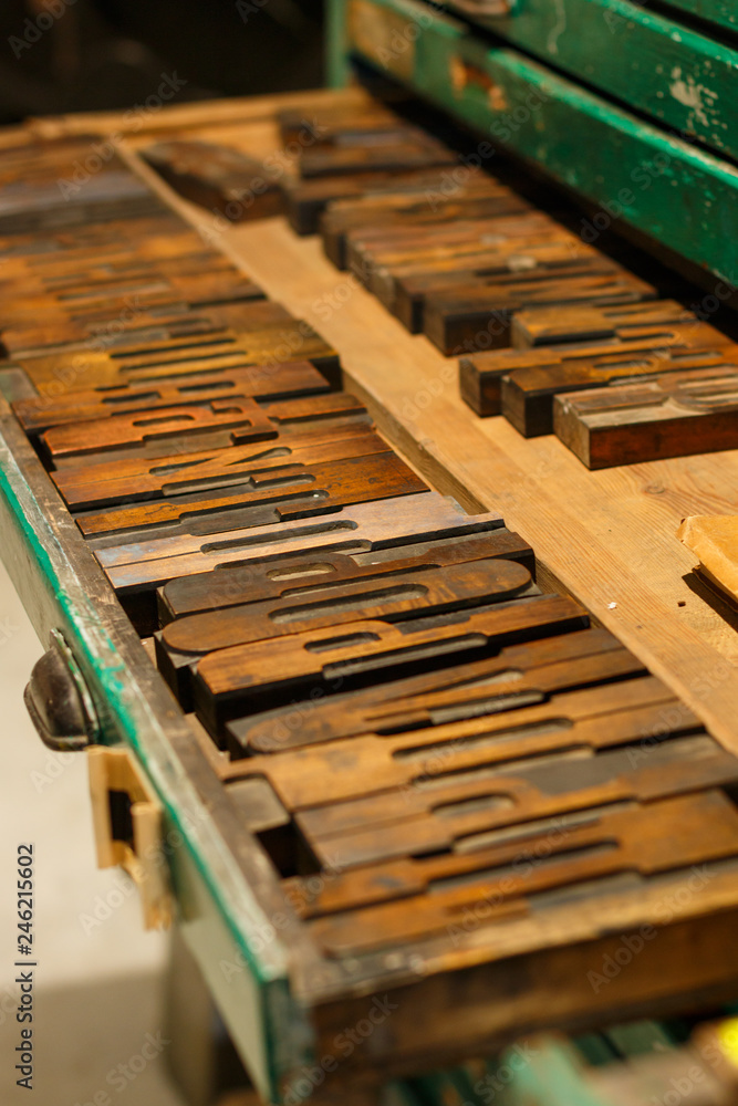 The set of the authentic wooden letters (also named as sort or type) from Cyrillic alphabet used some time ago for letterpress printing The set of the authentic wooden letters (also named as sort or type) from Cyrillic alphabet used some time ago for letterpress printing