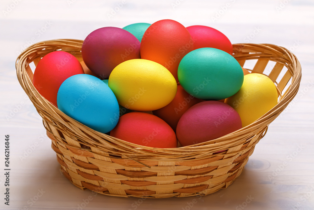 Many Easter colored eggs in the basket. Close-up Many Easter colored eggs in the basket. Close-up
