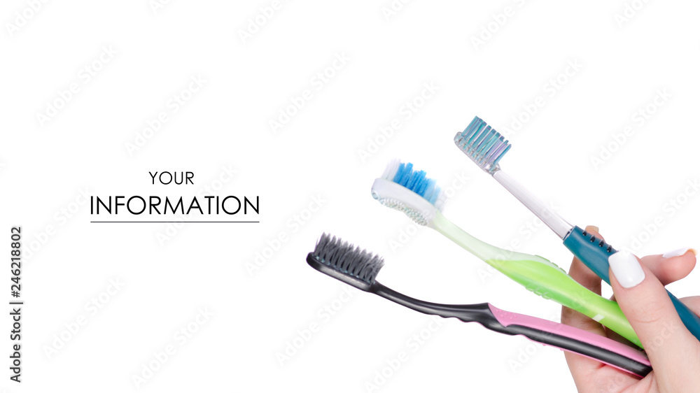 Female hands with toothbrushes for the whole family pattern on white background isolation Female hands with toothbrushes for the whole family pattern on white background isolation