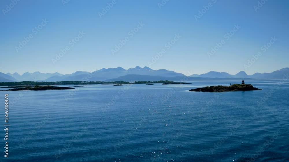 Sail The Blue North Sea Near The Coast With Fjords Sun Rays Shine On The Water Sail The Blue North Sea Near The Coast With Fjords Sun Rays Shine On The Water