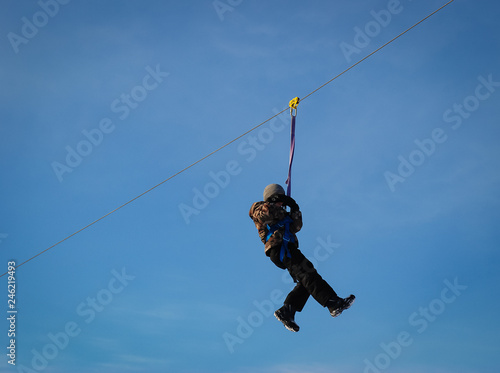 Boy on the rope in the sky