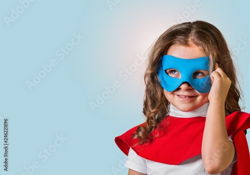 Cute Child boy in superhero costume