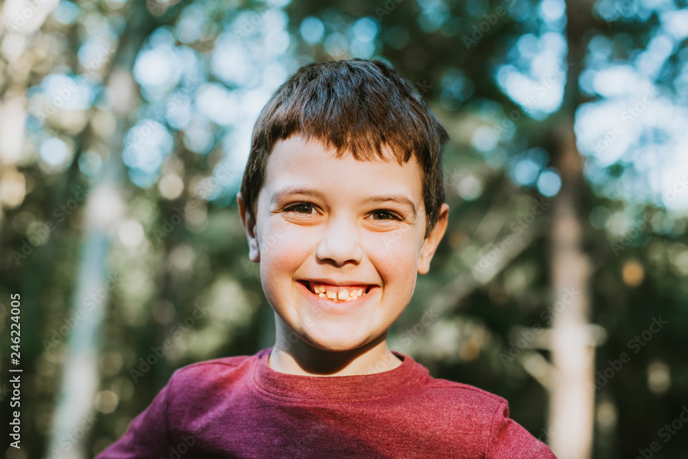 Portrait of cute smiling boy in park Portrait of cute smiling boy in park