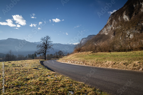 beautiful empty road curve in countryside, slovenia