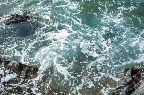 Waves splashing against the rocks. Lanzarote island.