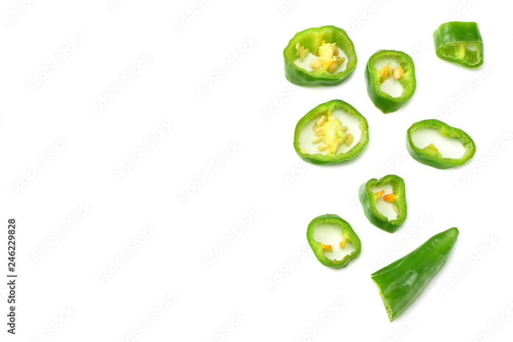 sliced green hot chili peppers isolated on white background top view sliced green hot chili peppers isolated on white background top view