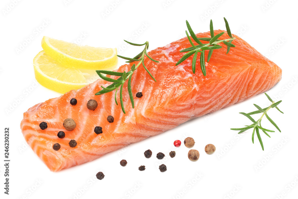 Red fish. Raw salmon fillet with rosemary and lemon isolate on white background. Red fish. Raw salmon fillet with rosemary and lemon isolate on white background.