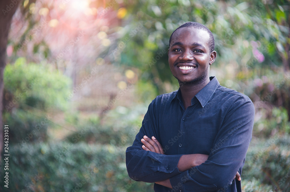 Portrait of a handsome African man smiling. Portrait of a handsome African man smiling.