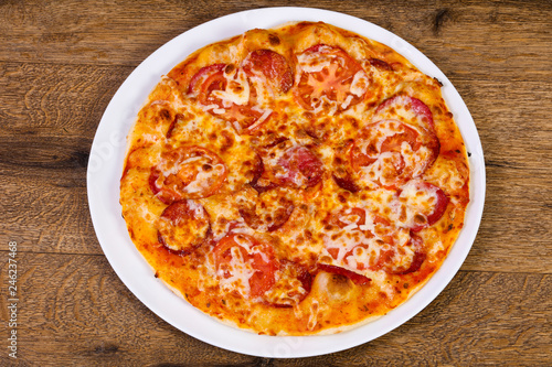 Pepperoni pizza with sausages