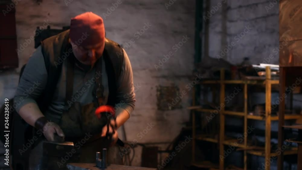 Smith is hammering the horseshoe Smith is hammering the horseshoe
