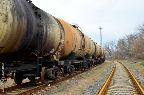 Railway tanks, transportation of oil, gasoline, oil or gas by rail. Logistics of transportation of goods by train by rail