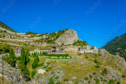 a small village situated on slopes of the pyrenees mountains in Andorra photo