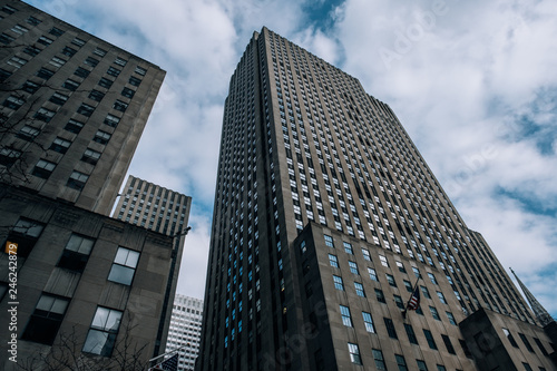 Underside panoramic and perspective view to facade fragment of Rockefeller Center building in midtown Manhattan