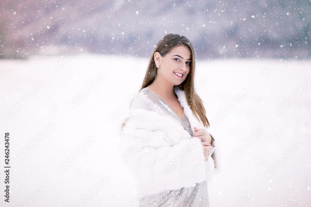 Besutiful woman portrait in the snow Besutiful woman portrait in the snow