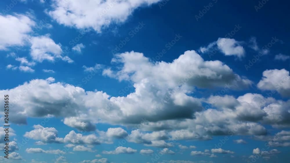 Time lapse clip of white fluffy clouds over blue sky. Time lapse clip of white fluffy clouds over blue sky.