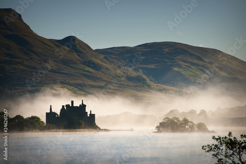 Scottish castle in the dawn mist