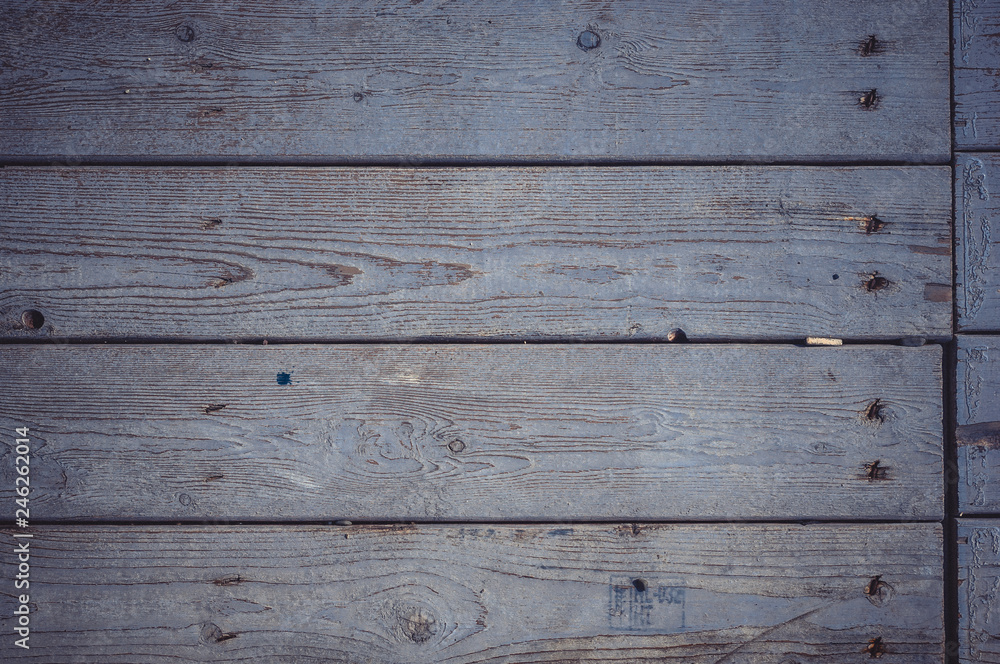 texture of the painted shabby wooden flooring made of boards, grunge background texture of the painted shabby wooden flooring made of boards, grunge background