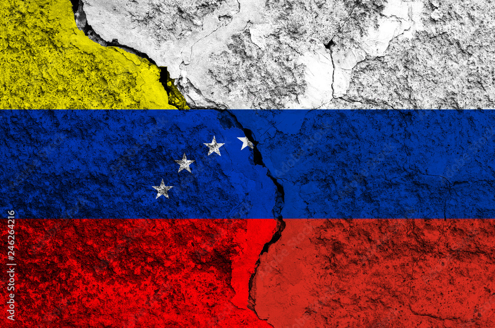 Flag of Venezuela and Russia on the background of the texture of frayed paint with a crack on the whole frame