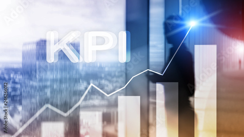 KPI - Key Performance Indicator. Business and technology concept. Multiple exposure, mixed media. Financial concept on blurred background
