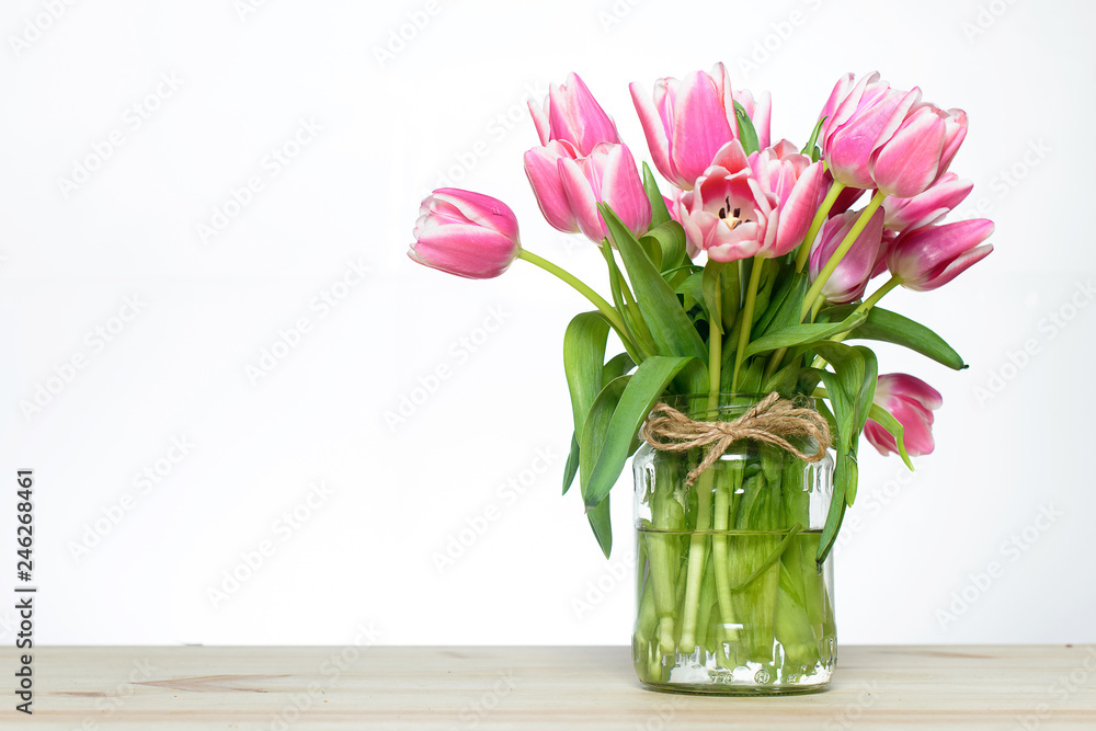 Pink tulips. Spring concept. March 8. Close-up with copyspace. Pink tulips. Spring concept. March 8. Close-up with copyspace.