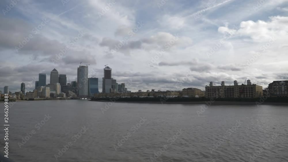 Time lapse. Clouds moving over London cityscape by the riverside. Time lapse. Clouds moving over London cityscape by the riverside.