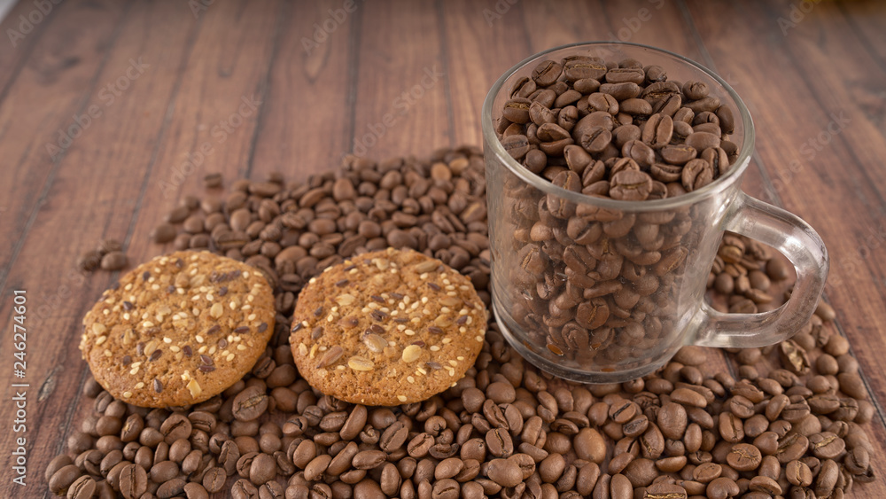 Oatmeal cookies and coffee beans. The concept of morning Breakfast