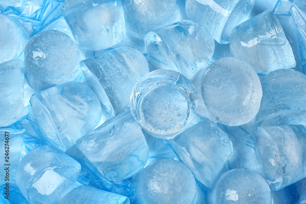 Many pieces of ice on color background, top view Many pieces of ice on color background, top view