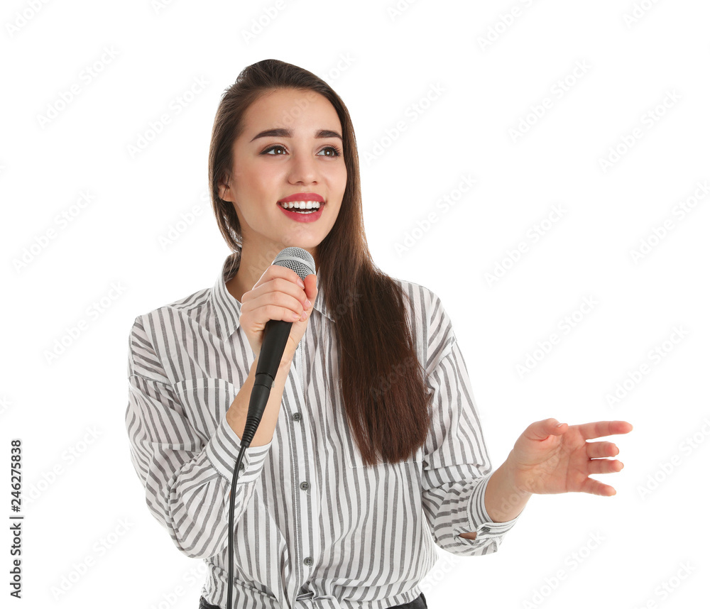 Young woman in casual clothes posing with microphone on white background Young woman in casual clothes posing with microphone on white background
