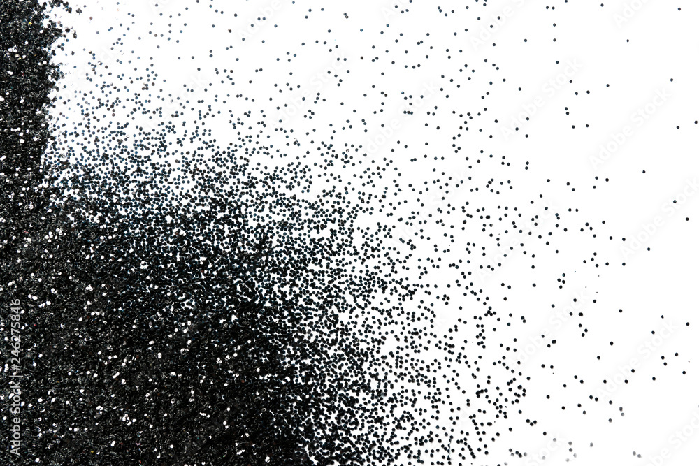 Shiny black glitter on white background, top view with space for text Shiny black glitter on white background, top view with space for text