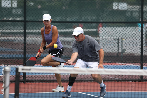 mixed doubles pickleball play