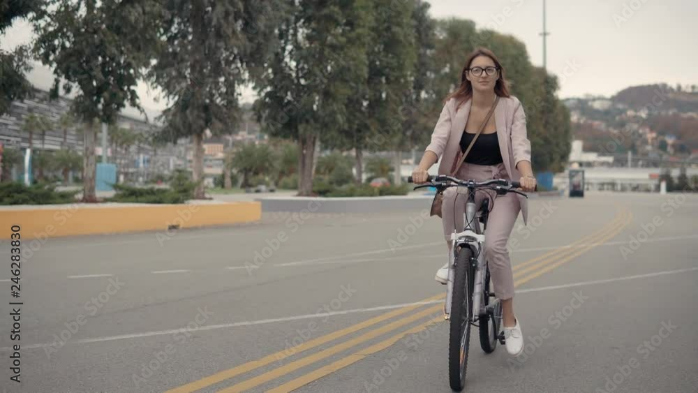 Nice girl on a bicycle outdoor. Nice girl on a bicycle outdoor.
