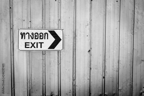 black and white Exit Sign