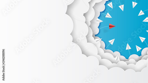 Paper airplanes flying on clouds and blue sky.Paper art style of business leadership and teamwork creative concept idea.Vector illustration.