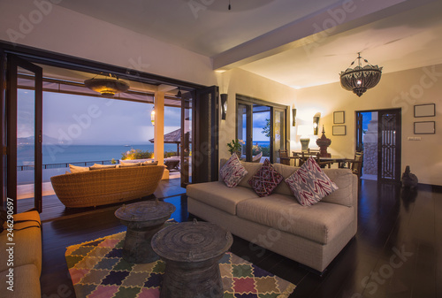 Luxury villa living room interior. Sea view © Annatamila