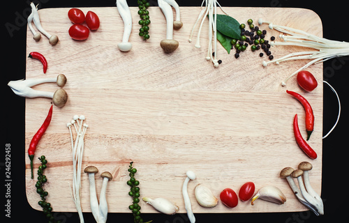 Modern minimalism Food still life with mushrooms and chilli on a wooden background. Space for text