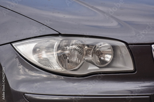 shiny headlight on a white car