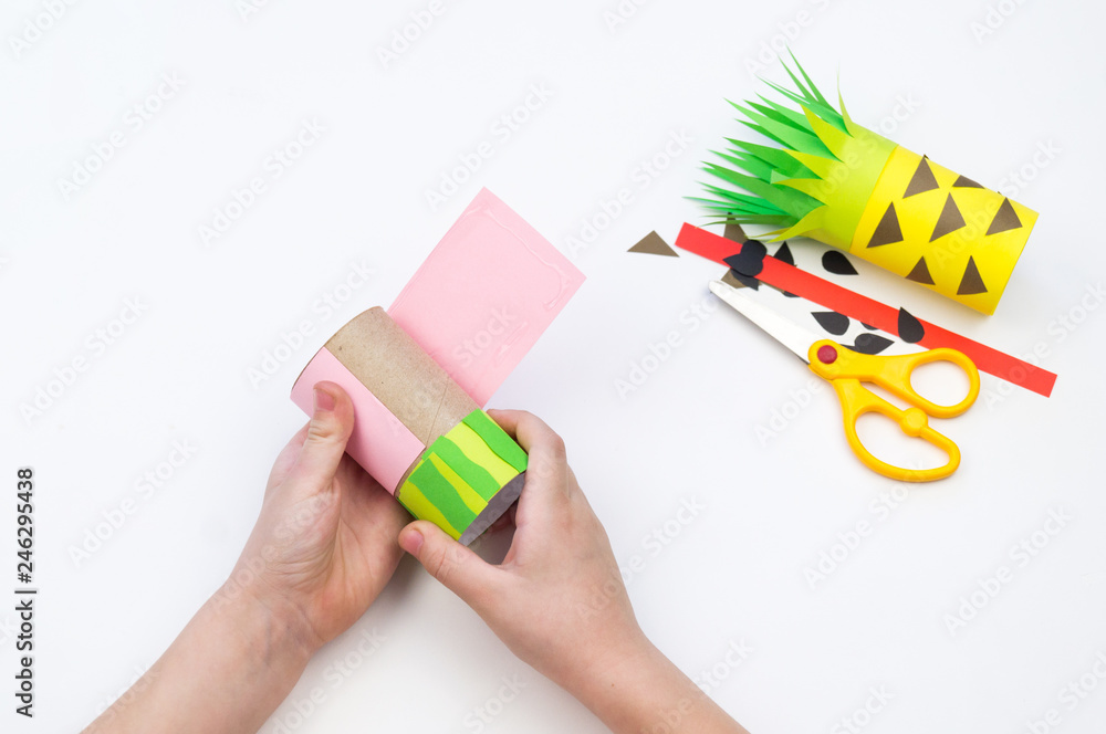 Child does the handicraft. Fruit paper. Pineapple and Watermelon summer. Child does the handicraft. Fruit paper. Pineapple and Watermelon summer.