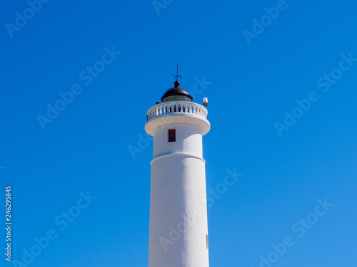 White Lighthouse with a blue sky