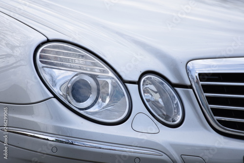 Car's exterior detail, headlight on a  new car © Laurenx