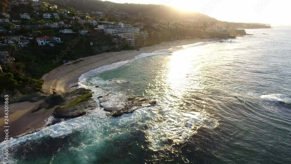 California, United States, Aerial view of beach houses along Pacific Coast in California. Real estate during sunset. From above, drone flying over water. California, United States, Aerial view of beach houses along Pacific Coast in California. Real estate during sunset. From above, drone flying over water.