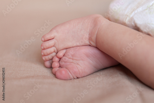 Photo of little feet of newborn baby.