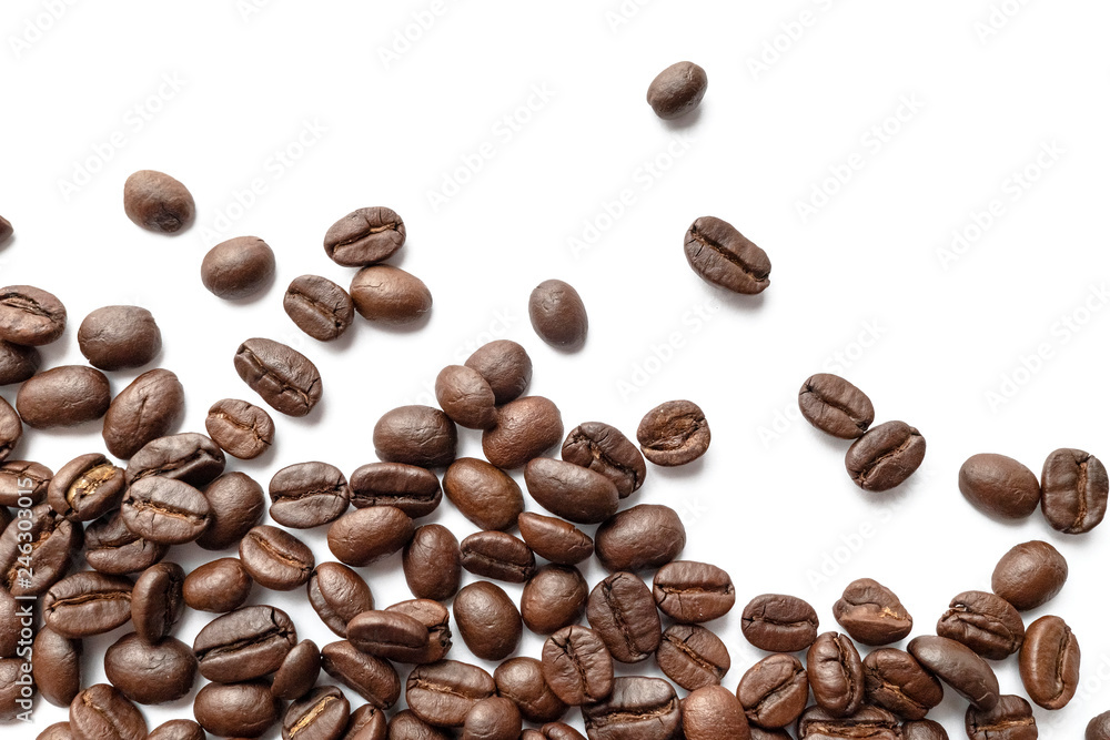Roasted coffee beans isolated on white background. Close-up. Roasted coffee beans isolated on white background. Close-up.