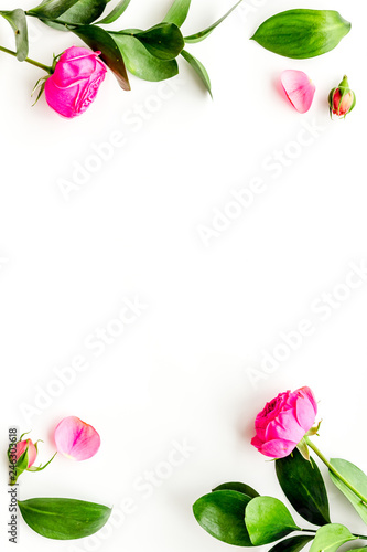 Rose flowers background. Rose roses on white background top view copy space frame