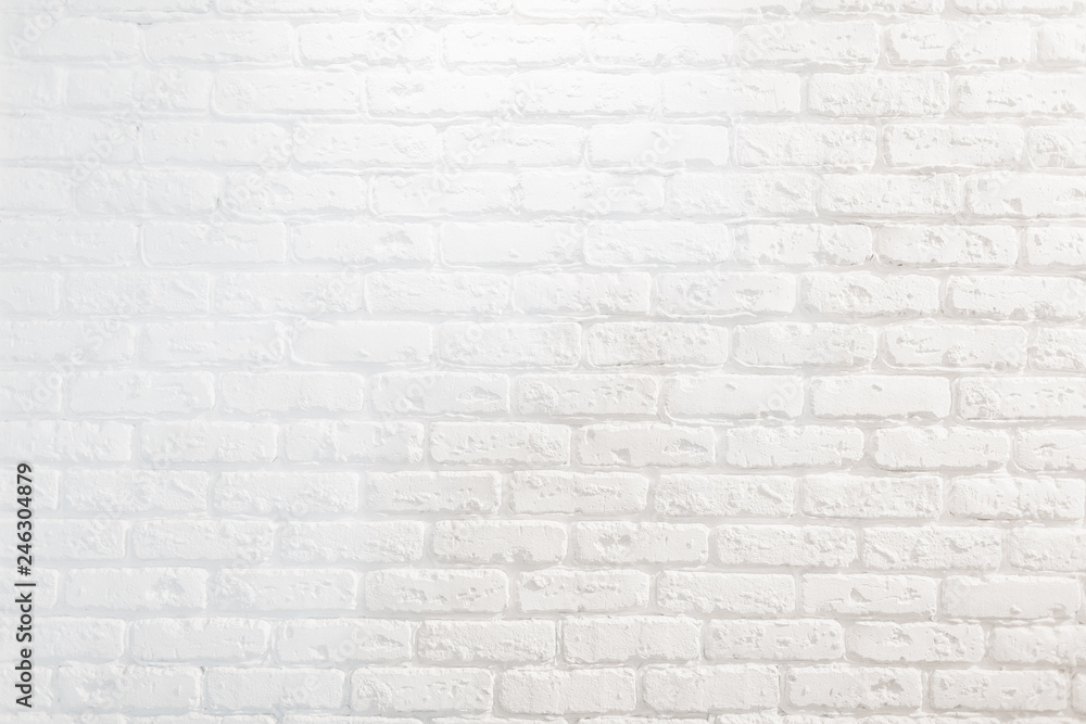 White painted brick wall in a modern loft apartment. Background texture