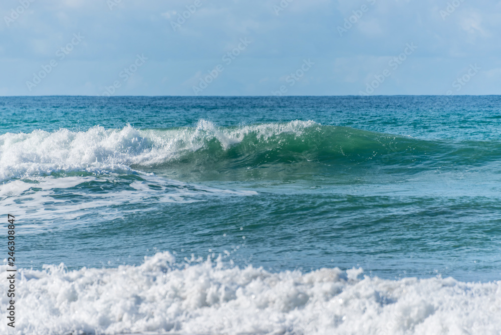Fototapeta premium Waves Crashing Onto the Beach on the Southern Italian Mediterranean Coast