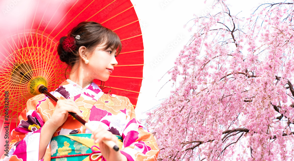 Fototapeta premium Kobieta kwiat wiśni i kimono