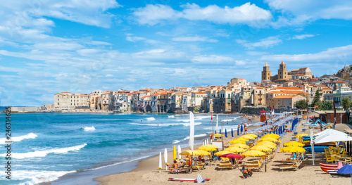 Fototapeta Naklejka Na Ścianę i Meble -  Cefalu, Sicily - September  24, 2018: Landscape with beach and medieval Cefalu town, Sicily island, Italy